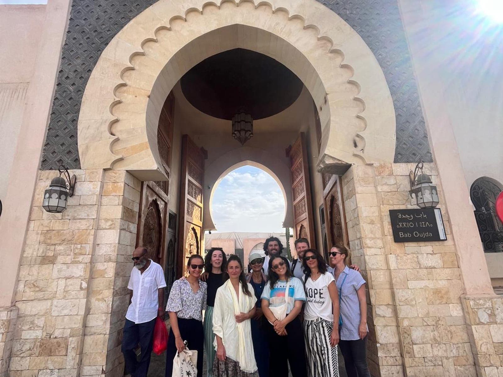 Remote team cultural exploration at historic gate